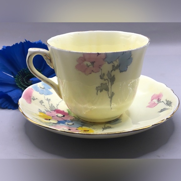Crown Staffordshire Teacup & Saucer Pale Yellow w/Blue, Pink, and Yellow Flowers - Picture 9 of 10